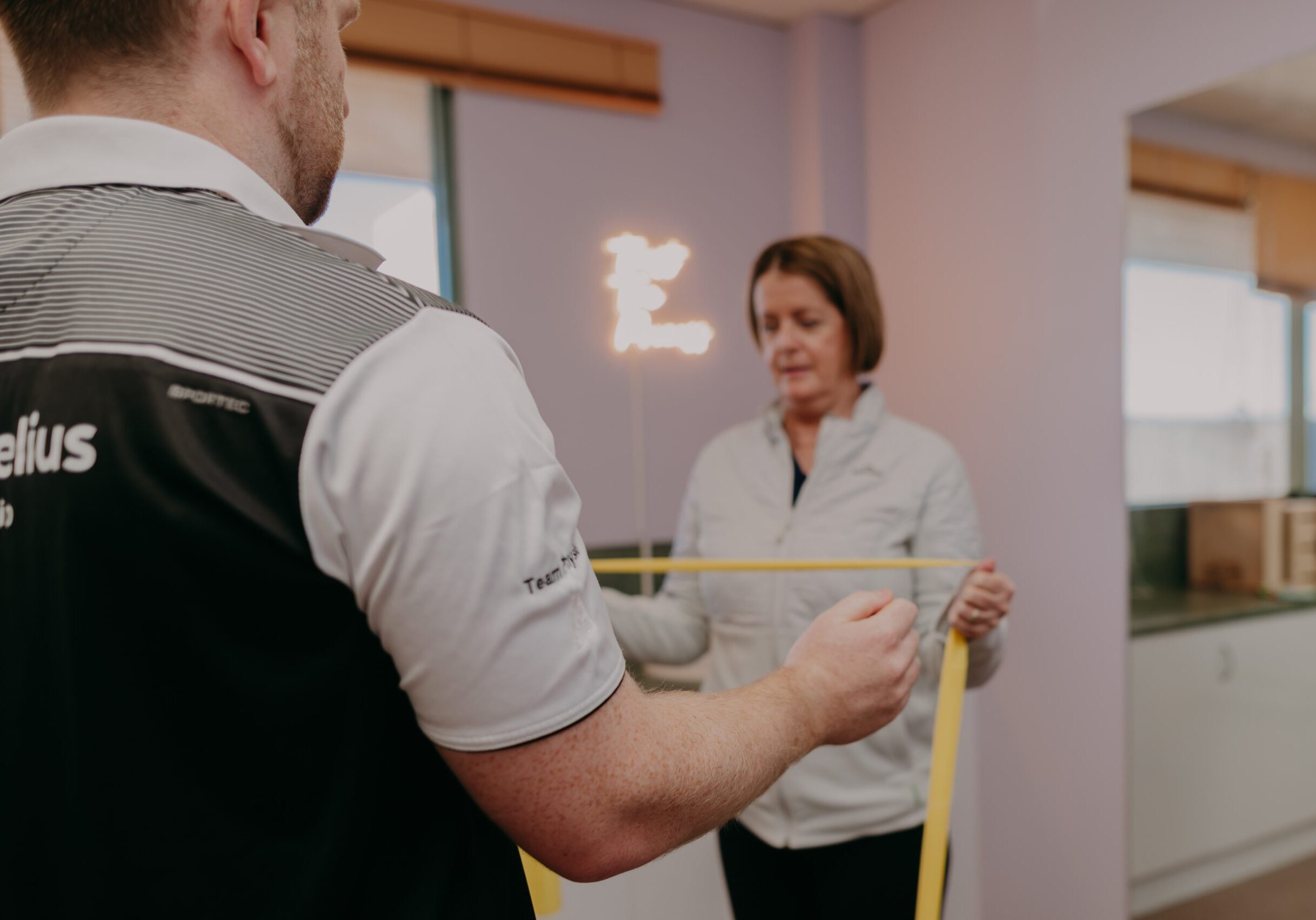 ProMelius physiotherapist helping client in Hervey Bay